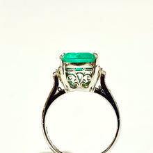 Platinum Set Emerald and Diamond Ring