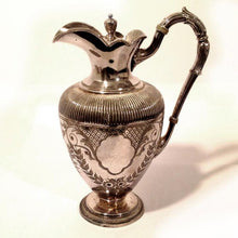 Ornate Silver Pitcher