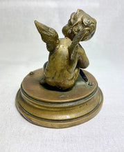Antique Bronze Cupid Statue