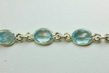 Oval Blue Topaz and Sterling Silver Bracelet