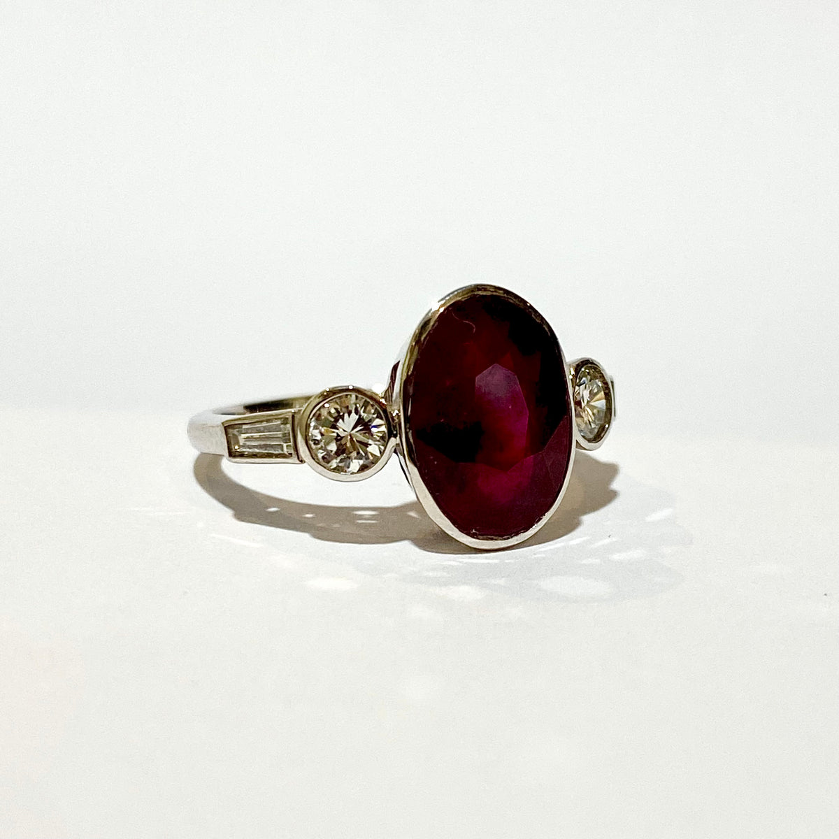 9ct White Gold, Ruby and Brilliant cut, Baguette cut Diamond Ring