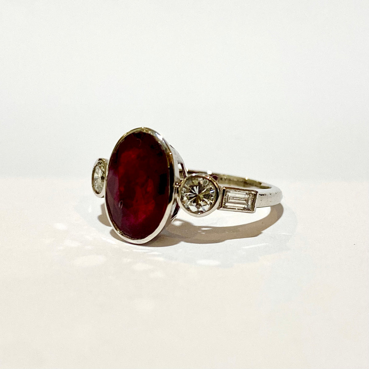 9ct White Gold, Ruby and Brilliant cut, Baguette cut Diamond Ring