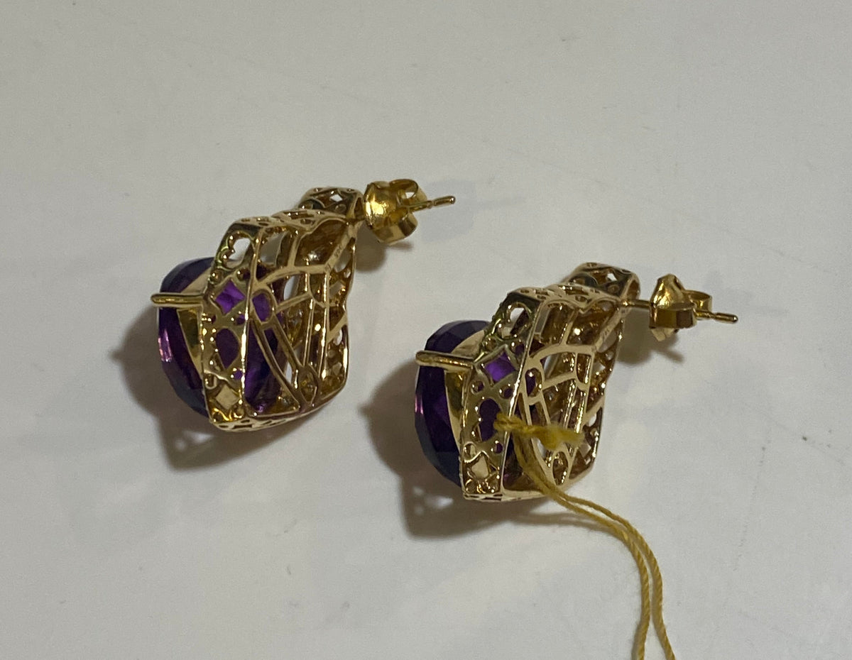 Vintage 7 Carat Amethyst Stud Earrings set in 14 carat Yellow Gold and surrounded by Diamonds