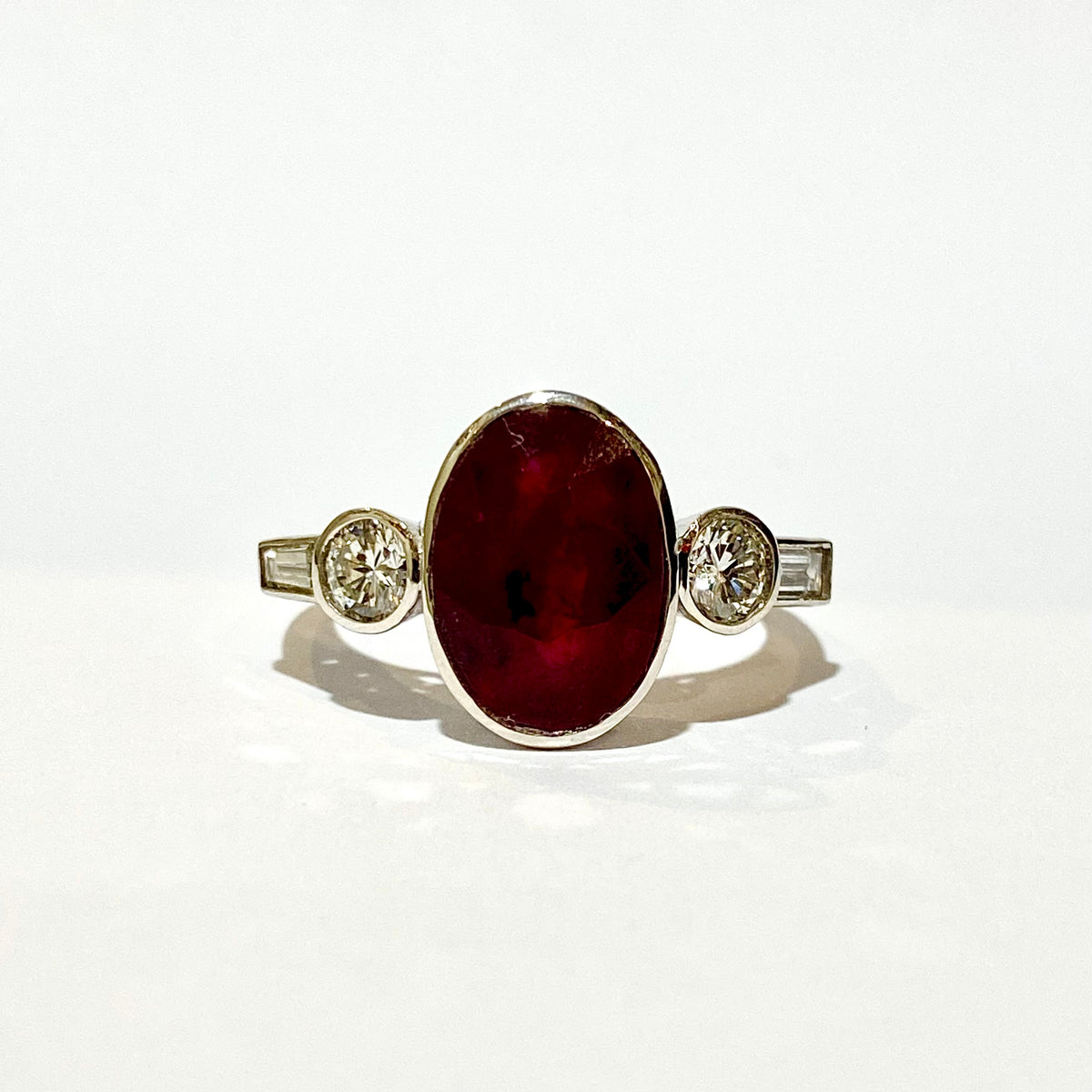 9ct White Gold, Ruby and Brilliant cut, Baguette cut Diamond Ring