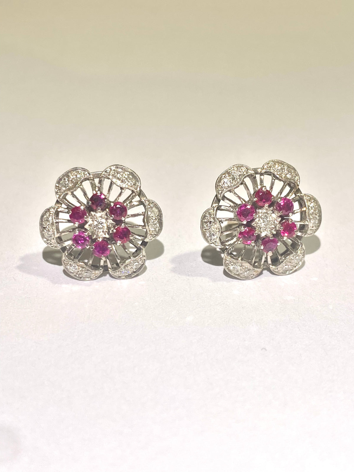 9ct white gold floral design Ruby and diamond stud earrings