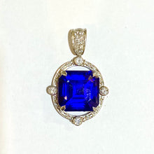 18ct White Gold Tanzanite and Diamond Pendant