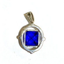 18ct White Gold Tanzanite and Diamond Pendant