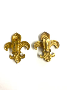 Gold plated fluidly clip on earrings costume $295
