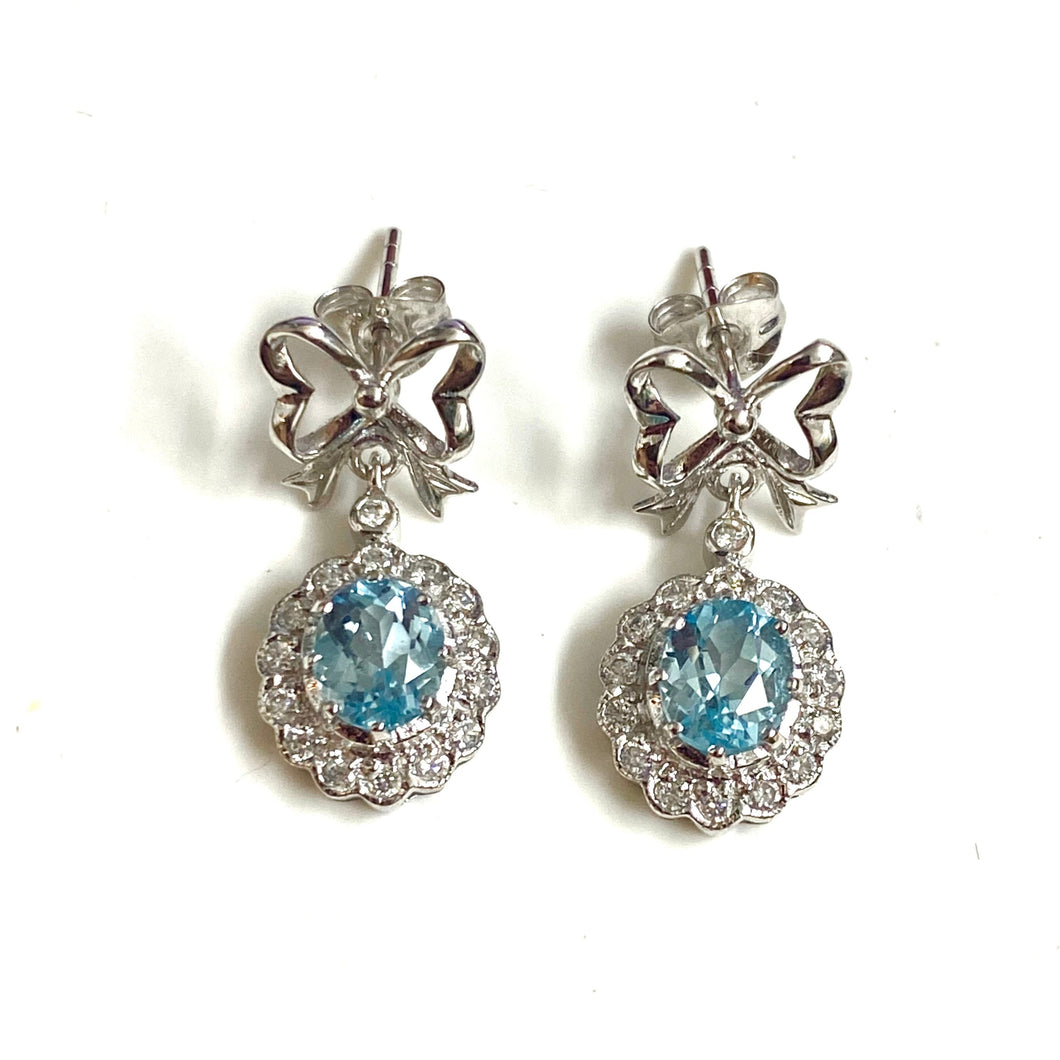 9ct White Gold Blue Topaz and Diamond Bow Earrings