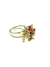 18ct white gold Modernist cocktail ring. Sit with rubies and diamonds price.