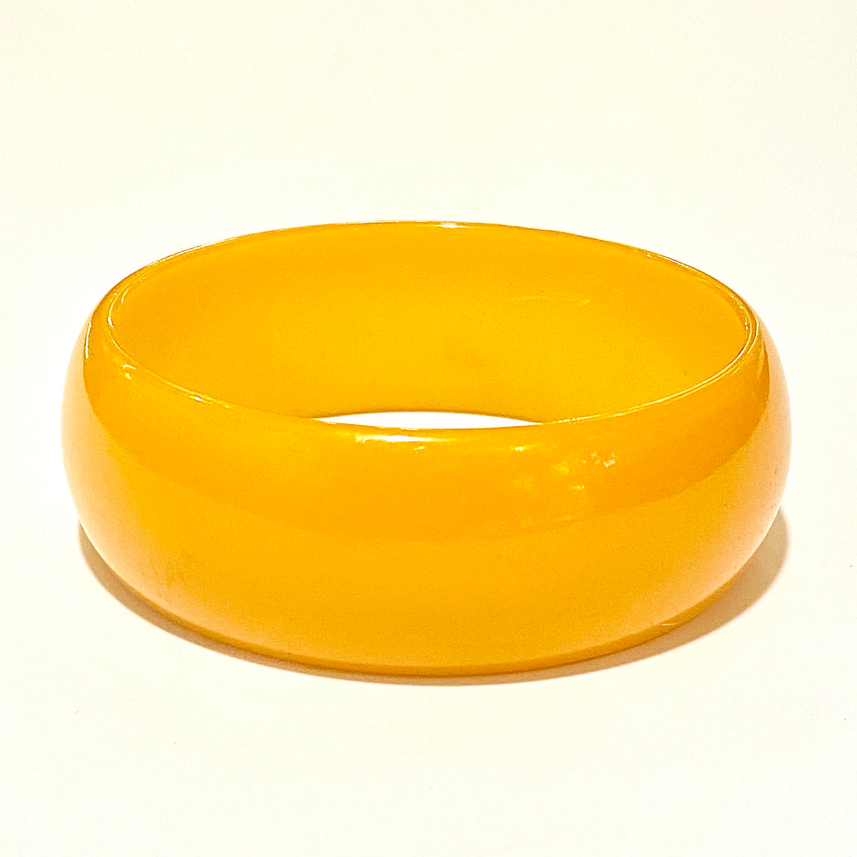 Antique Marigold Orange Bakelite Solid Bangle