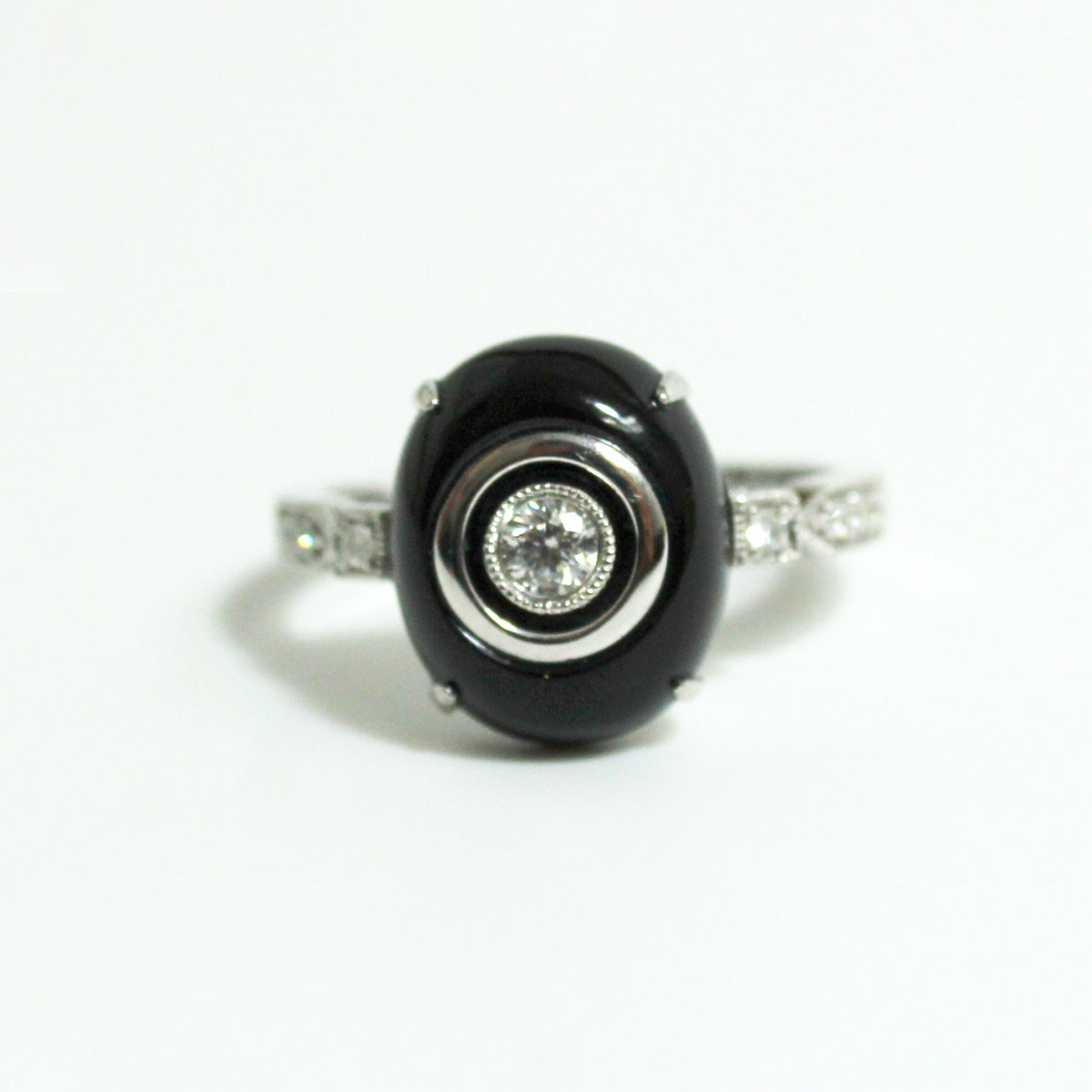 9ct White Gold Black Onyx and 0.20ctw Diamond Ring
