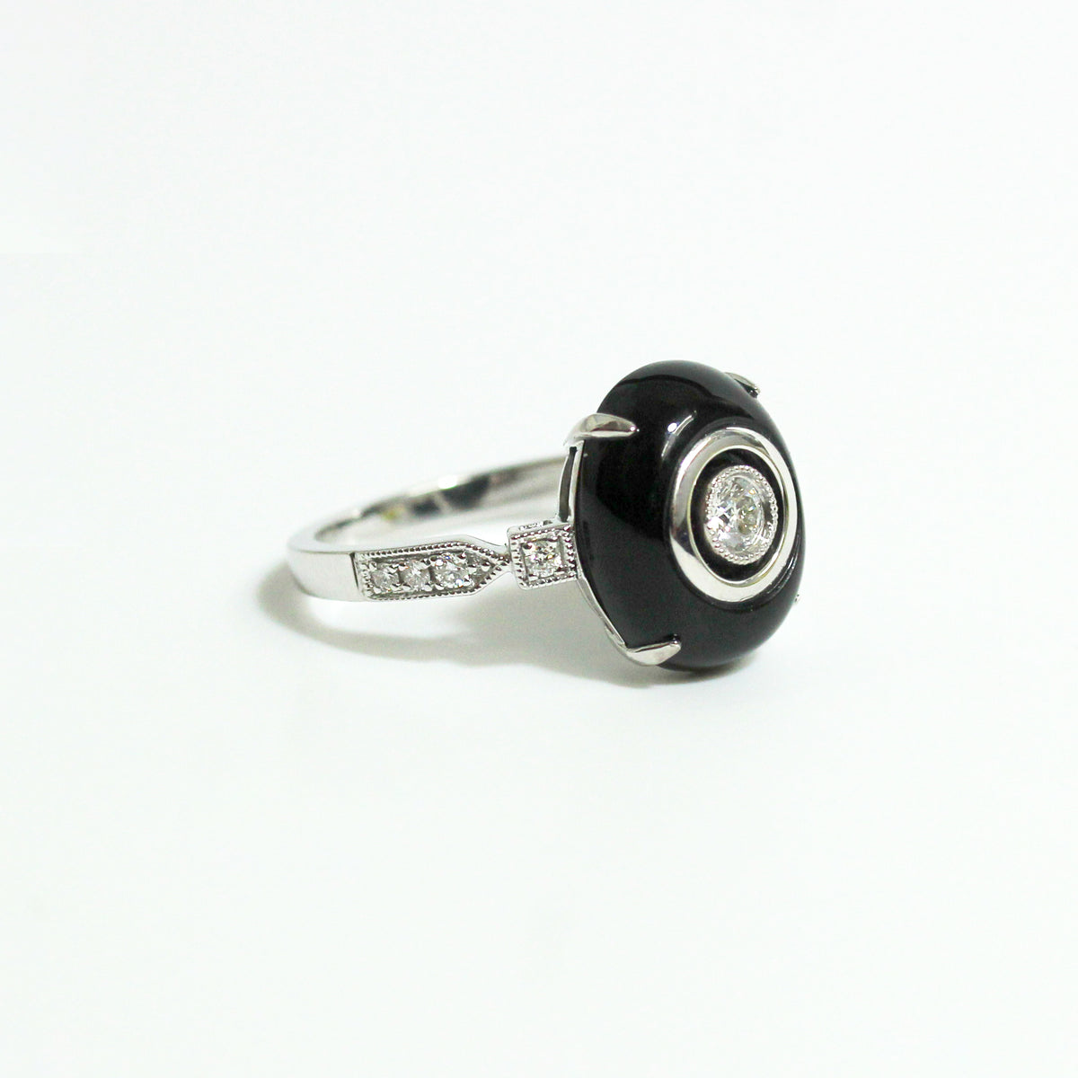 9ct White Gold Black Onyx and 0.20ctw Diamond Ring