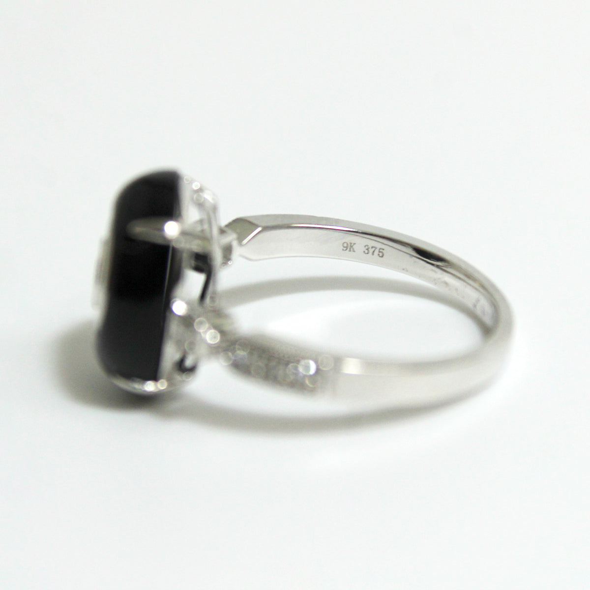 9ct White Gold Black Onyx and 0.20ctw Diamond Ring