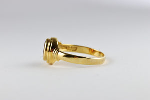 Oval 9ct Yellow gold Bezel Set Garnet Ring