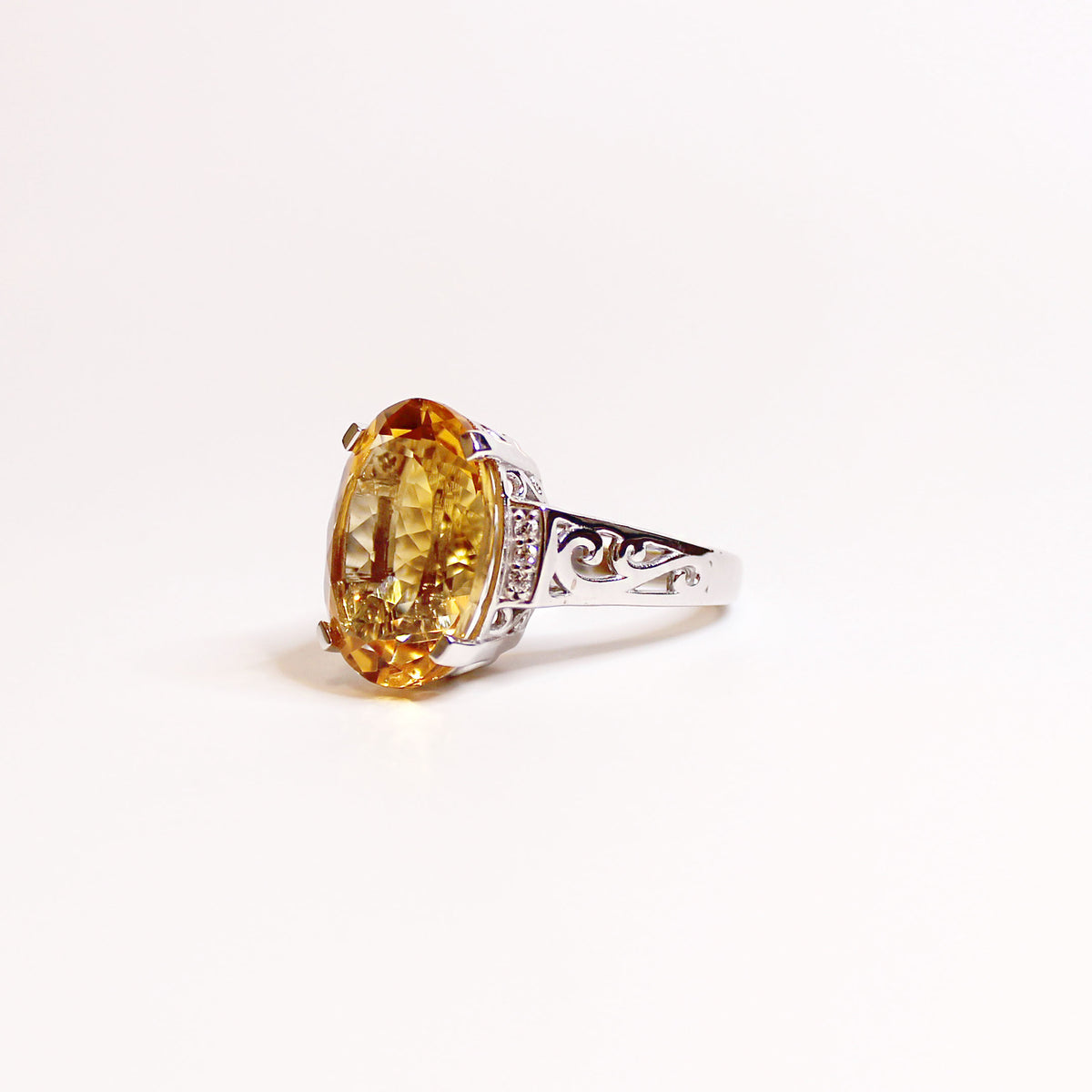 Sterling Silver Oval Cut Citrine and Cubic Zirconia Dress Ring