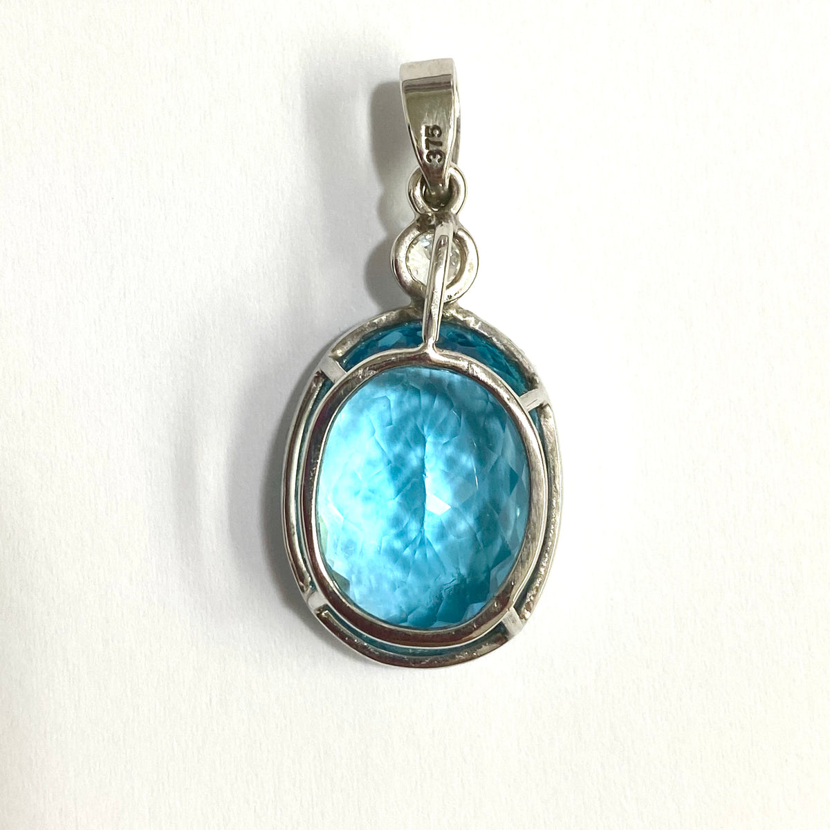 9ct White Gold 15ct Swiss Blue Topaz and Diamond Pendant