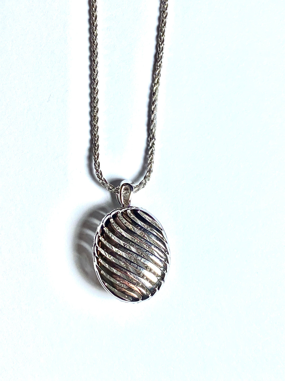 White Gold and Diamond Closed Locket Pendant