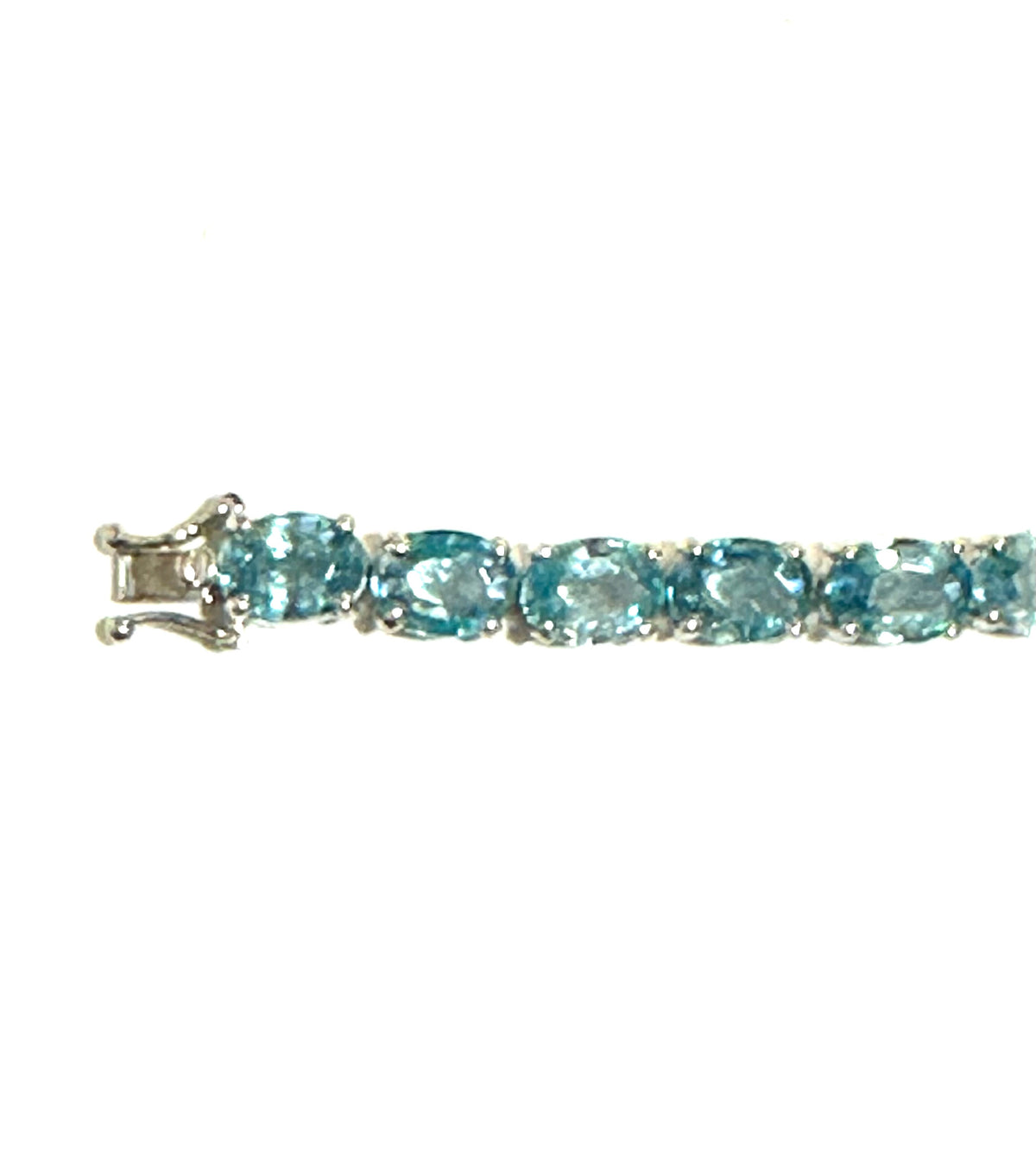 Sterling Silver Oval Faceted Blue Zircon Tennis Bracelet
