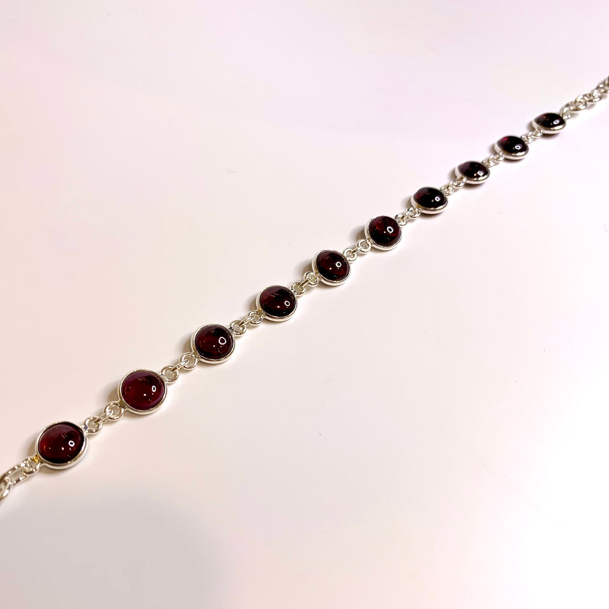 Sterling Silver Round Cabochon Cut Garnet Bracelet
