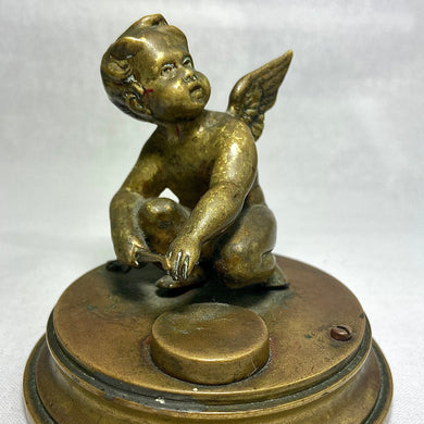 Antique Bronze Cupid Statue