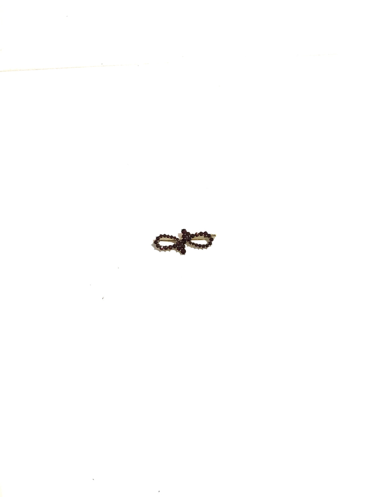 Curved Garnet Brooch