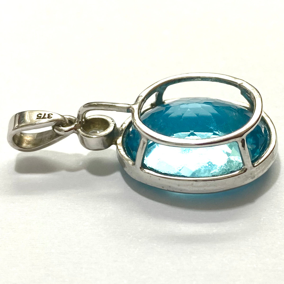 9ct White Gold 15ct Swiss Blue Topaz and Diamond Pendant