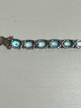 Sterling Silver Oval Faceted Blue Zircon Tennis Bracelet