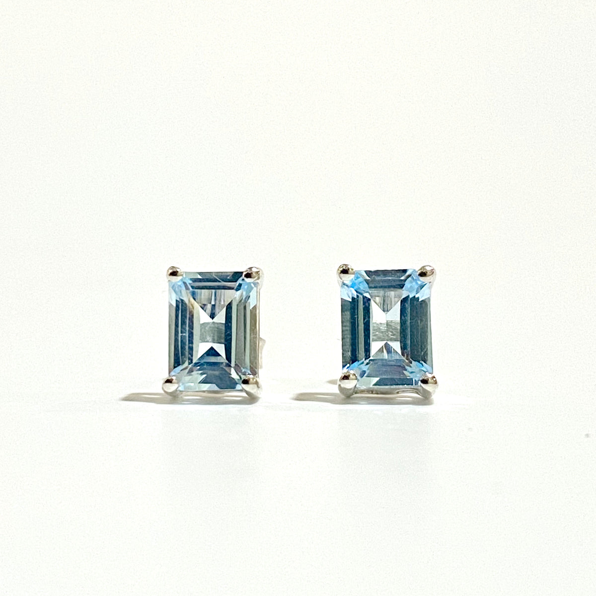 Sterling Silver Rectangular Cut Blue Topaz Stud Earrings