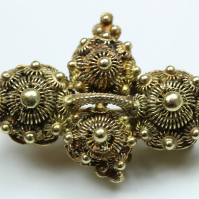 Gold Brooch Featuring Cannetille Work