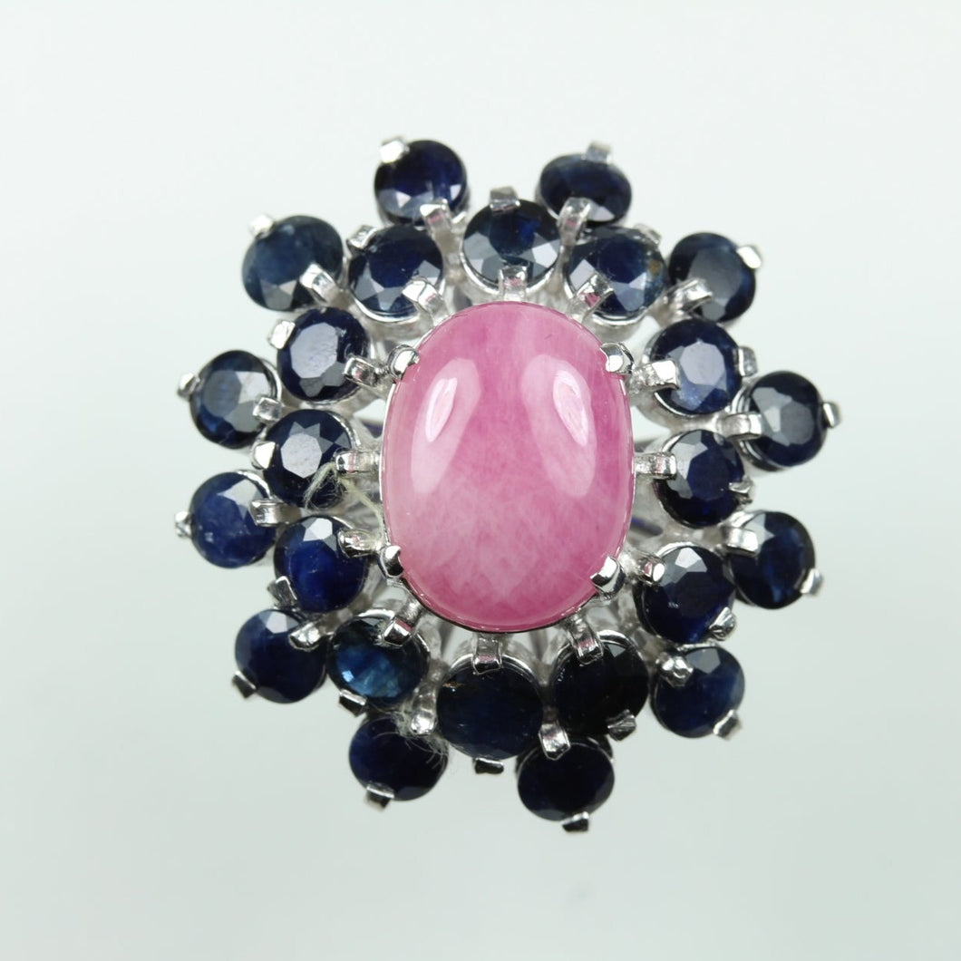 Sterling Silver Cabochon Ruby With Surrounding Sapphires Ring