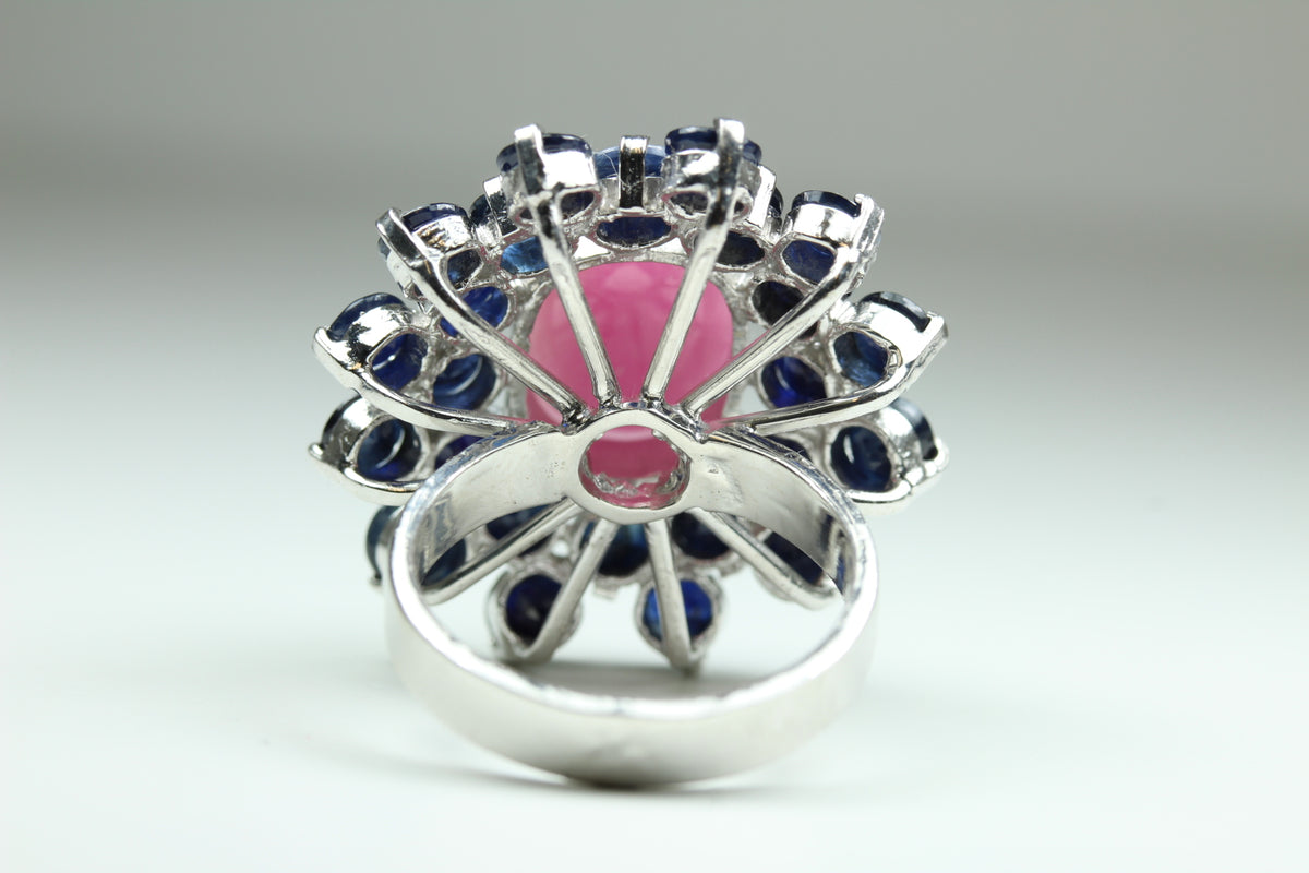 Sterling Silver Cabochon Ruby With Surrounding Sapphires Ring
