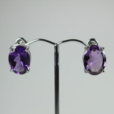 Sterling Silver Oval Cut Purple Amethyst Studded Earrings
