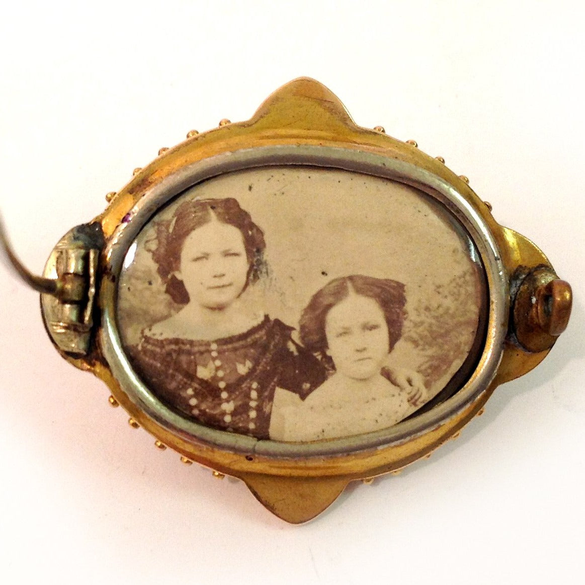 Antique Cabochon Tourmaline and White Enamel Mourning Brooch