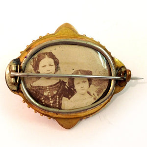 Antique Cabochon Tourmaline and White Enamel Mourning Brooch