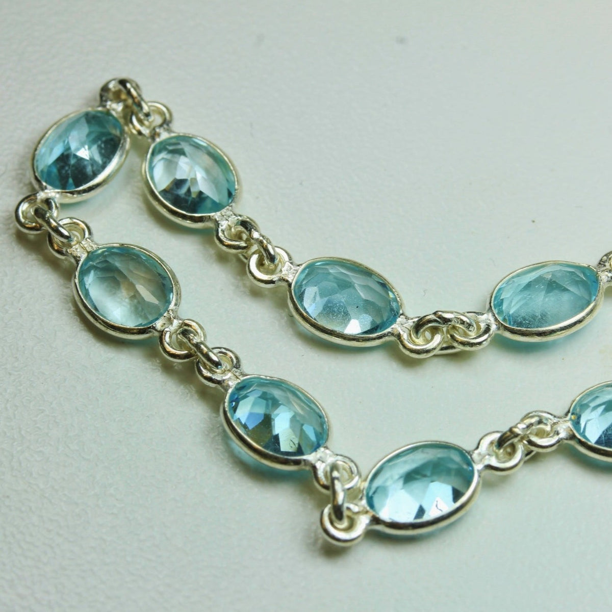 Oval Blue Topaz and Sterling Silver Bracelet