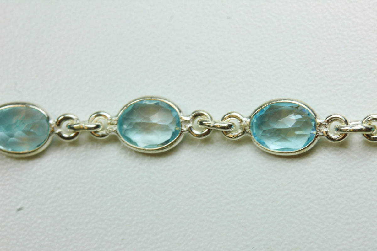Oval Blue Topaz and Sterling Silver Bracelet