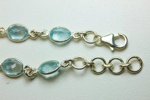 Oval Blue Topaz and Sterling Silver Bracelet